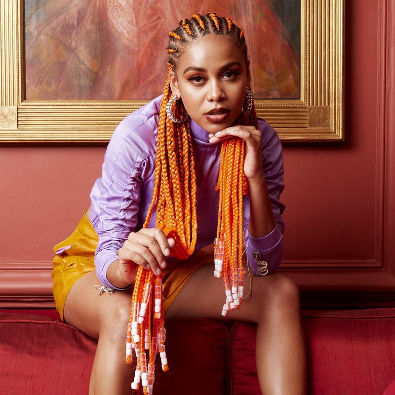 Sho Madjozi Sho Madjozi (Maya Wegerif) is a South African artist known for her Tsonga-inspired style and global hit John Cena. She combines cultural heritage with modern sounds.